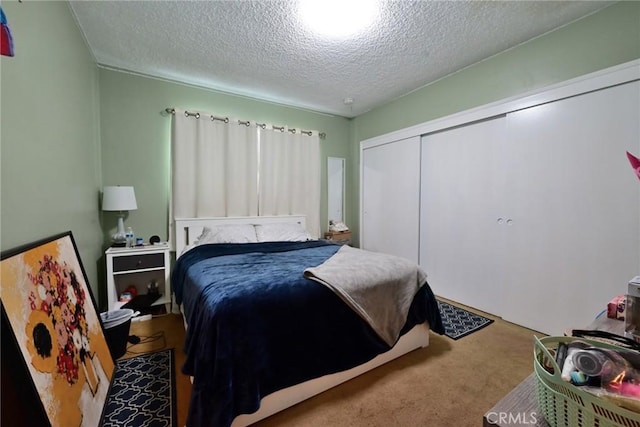 428 N Garfield Ave, Alhambra, CA 91801 - bedroom with carpet, a textured ceiling, and a closet