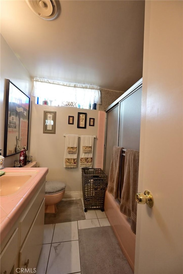 428 N Garfield Ave, Alhambra, CA 91801 - bathroom featuring toilet, shower / bath combination with glass door, tile patterned floors, and vanity