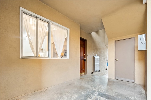 spare room featuring concrete flooring