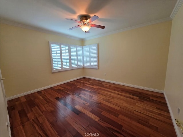 unfurnished room featuring ceiling fan, baseboards, dark wood-type flooring, and ornamental molding