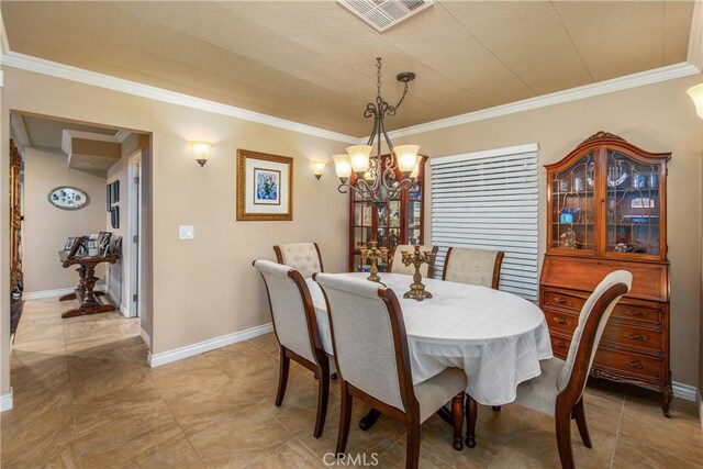929 E Foothill Unit 161, Upland, CA 91786 - dining room with baseboards, visible vents, and crown molding