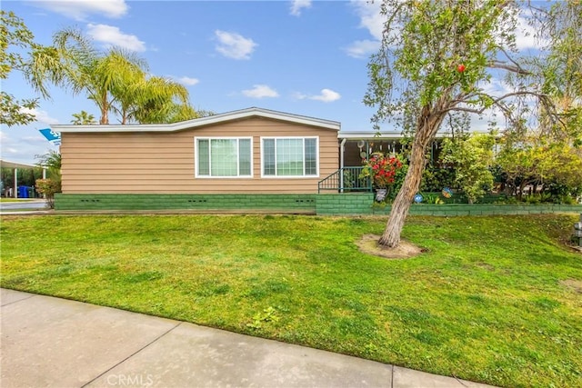 929 E Foothill Unit 161, Upland, CA 91786 - view of front facade featuring a front yard