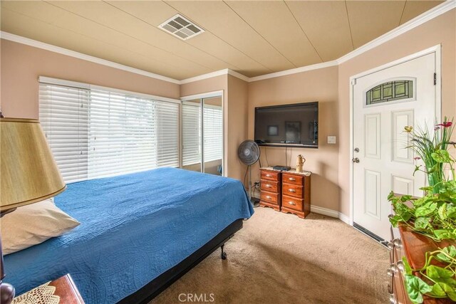 929 E Foothill Unit 161, Upland, CA 91786 - bedroom with baseboards, visible vents, crown molding, and carpet flooring