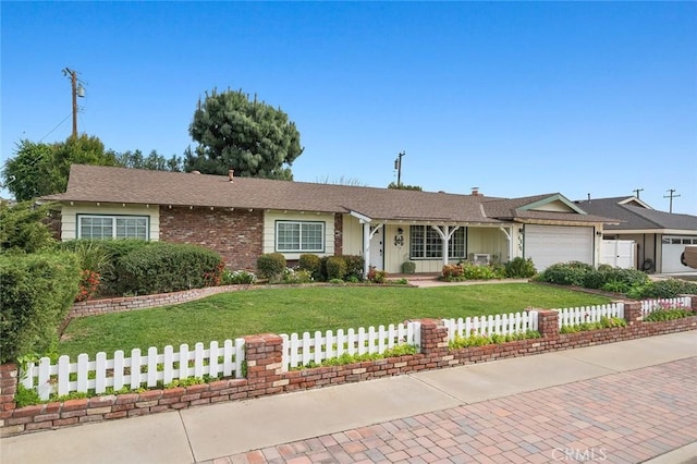 ranch-style house with a front yard, decorative driveway, fence, and an attached garage