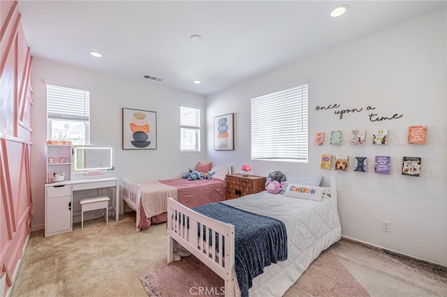 bedroom with recessed lighting and carpet