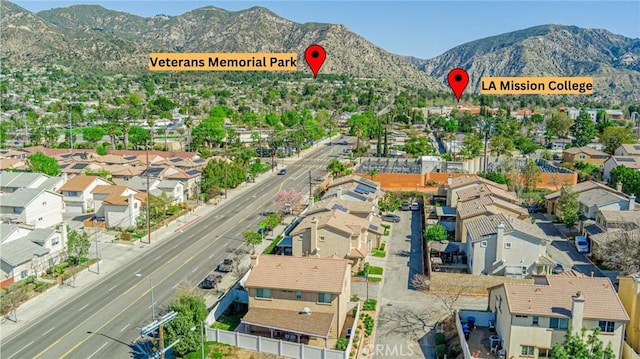 aerial view featuring a residential view and a mountain view