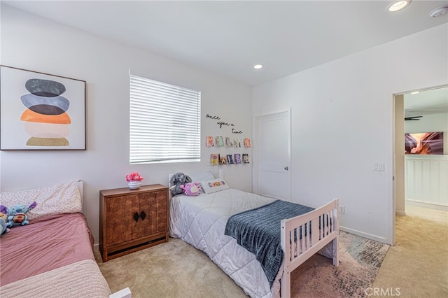 bedroom featuring recessed lighting, carpet, and baseboards