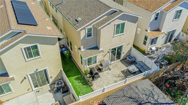 birds eye view of property with a residential view