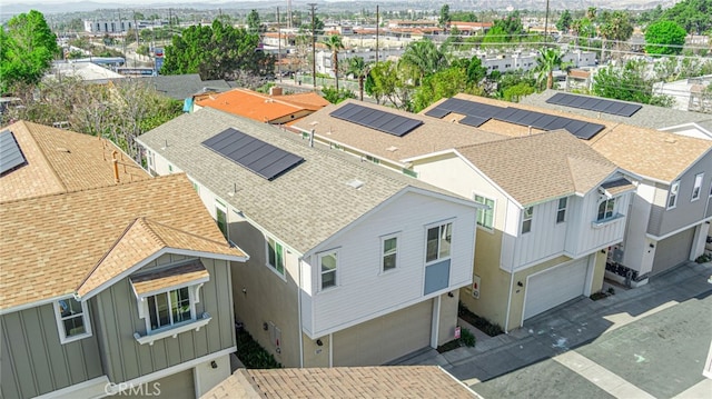 aerial view featuring a mountain view and a residential view