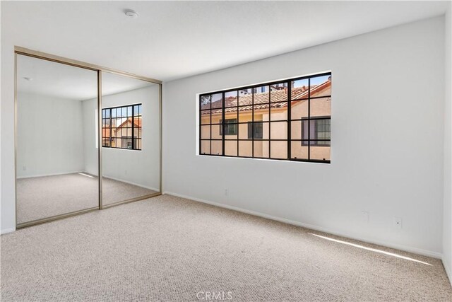 2008 Mathews Ave Unit C, Redondo Beach, CA 90278 - unfurnished bedroom featuring carpet flooring and a closet