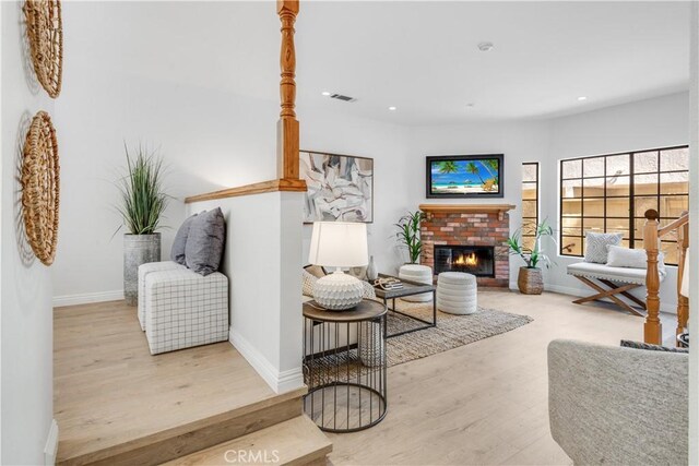 2008 Mathews Ave Unit C, Redondo Beach, CA 90278 - living room featuring wood finished floors, a fireplace, and recessed lighting