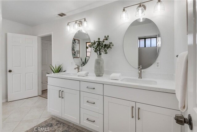 2008 Mathews Ave Unit C, Redondo Beach, CA 90278 - bathroom featuring double vanity and tile patterned floors