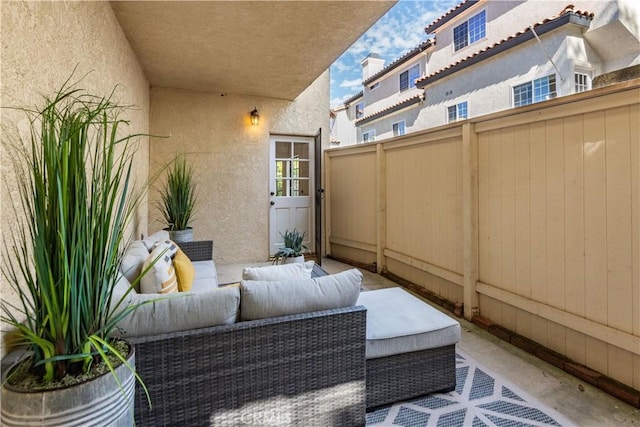 balcony with an outdoor hangout area