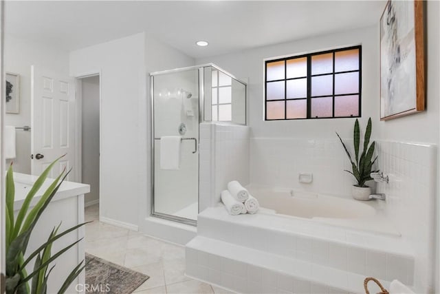 full bathroom with recessed lighting, a stall shower, a bath, baseboards, and tile patterned floors