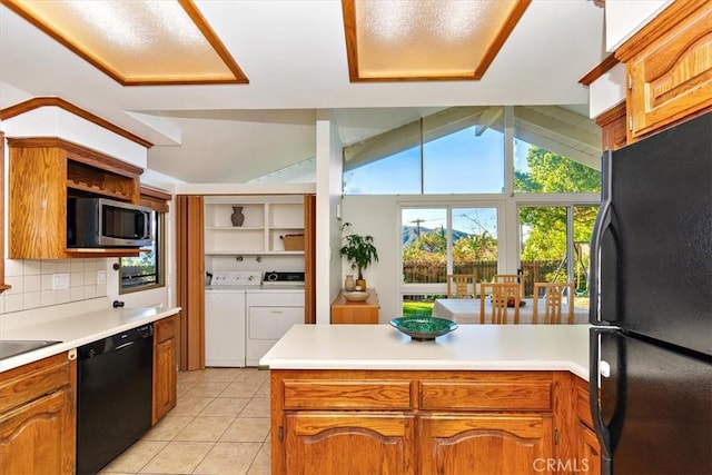 kitchen with tasteful backsplash, separate washer and dryer, light tile patterned flooring, black appliances, and open shelves