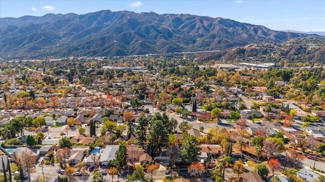 aerial view with a mountain view and a residential view