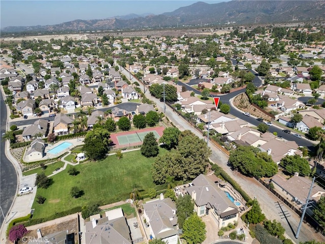 aerial view featuring a mountain view and a residential view