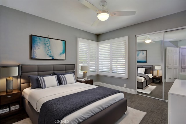 bedroom with a ceiling fan, a closet, and baseboards