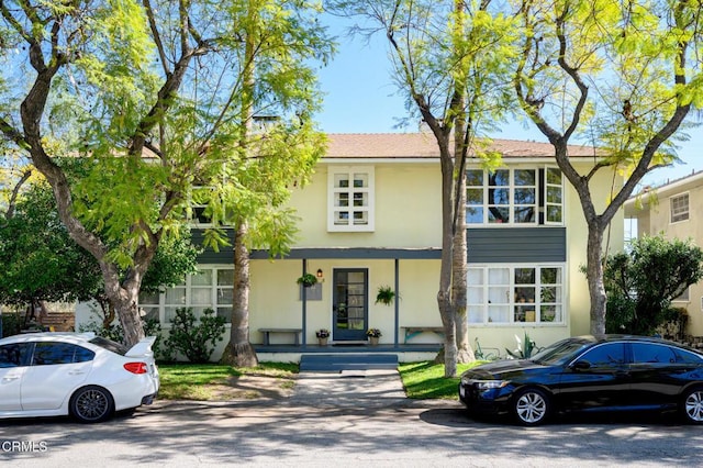 view of front facade featuring stucco siding