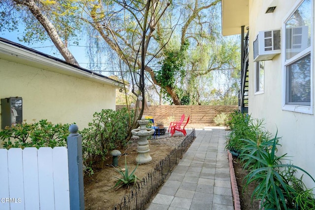 view of patio / terrace featuring fence