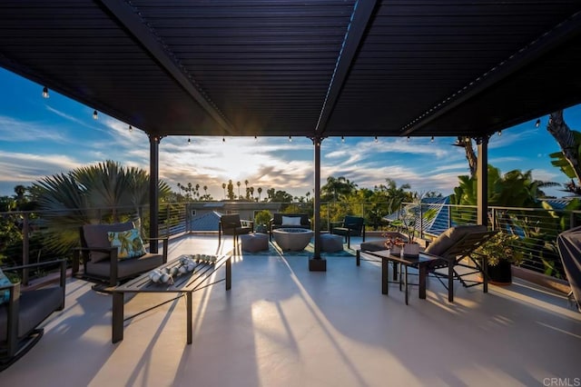 view of patio / terrace with an outdoor living space and a balcony