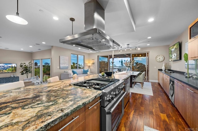 kitchen with island range hood, dark wood finished floors, high end stainless steel range, open floor plan, and recessed lighting