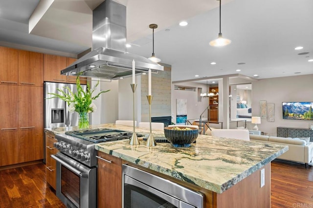 kitchen with island exhaust hood, modern cabinets, dark wood finished floors, brown cabinets, and stainless steel appliances