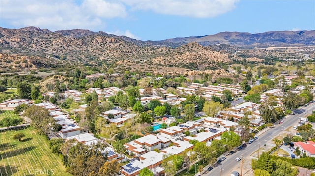 bird's eye view featuring a residential view and a mountain view