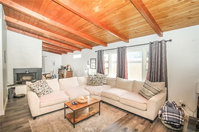 living room featuring wooden ceiling, wood finished floors, and beamed ceiling