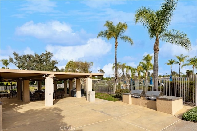 view of patio featuring a gazebo, fence, grilling area, and area for grilling