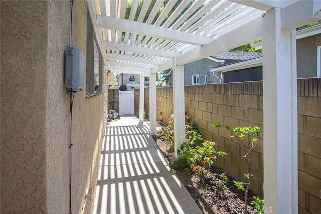 view of patio / terrace with fence and a pergola