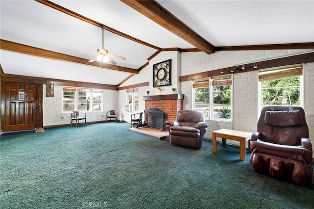 living room featuring lofted ceiling with beams, a brick fireplace, carpet flooring, and a ceiling fan