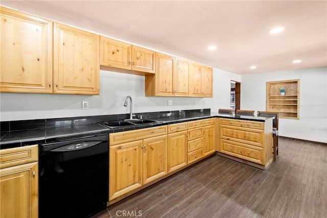 kitchen featuring tile counters, dishwasher, dark wood-style flooring, light brown cabinets, and a sink