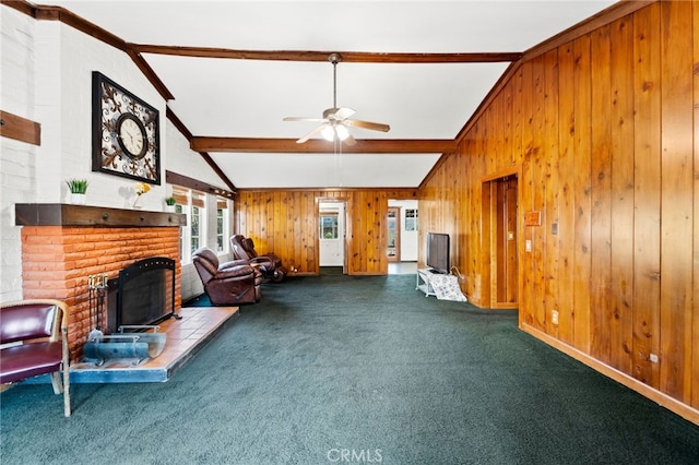 unfurnished living room with lofted ceiling with beams, wooden walls, carpet, and a brick fireplace