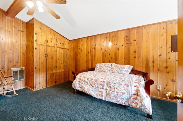 bedroom featuring lofted ceiling, ceiling fan, wooden walls, carpet flooring, and heating unit