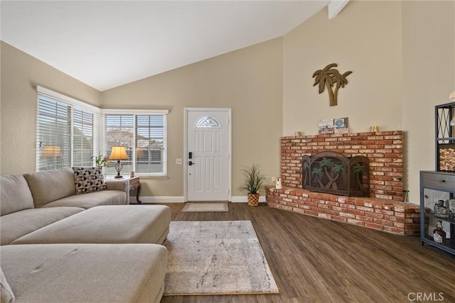 living room featuring high vaulted ceiling, a fireplace, wood finished floors, and baseboards