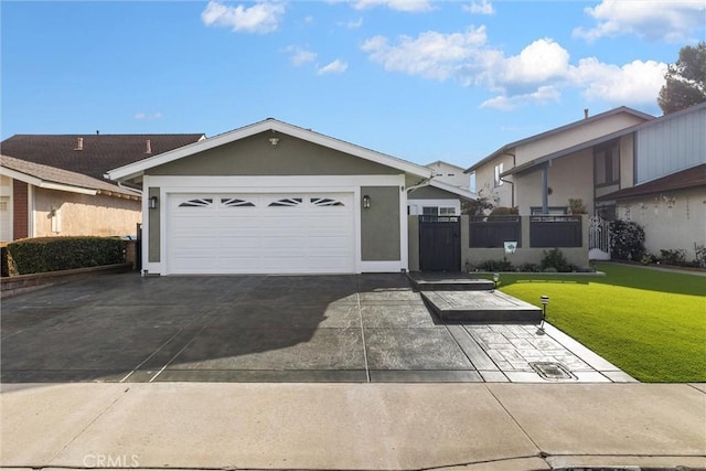 view of front of property featuring a garage, driveway, a front lawn, and stucco siding