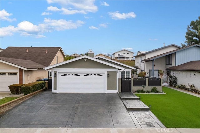 view of front of home with a garage, a front yard, driveway, and stucco siding