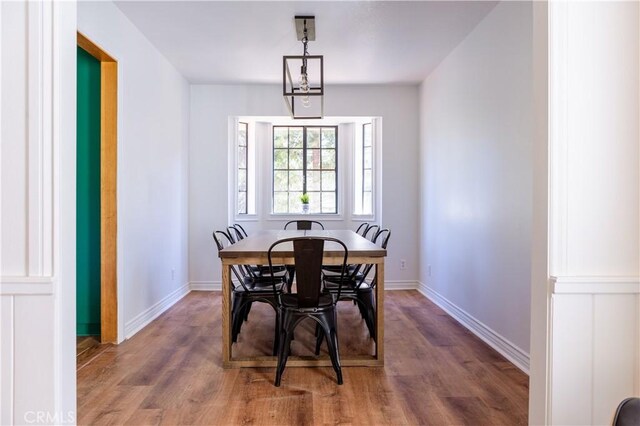 1075 Rivera Dr, Wrightwood, CA 92397 - dining space featuring baseboards and wood finished floors