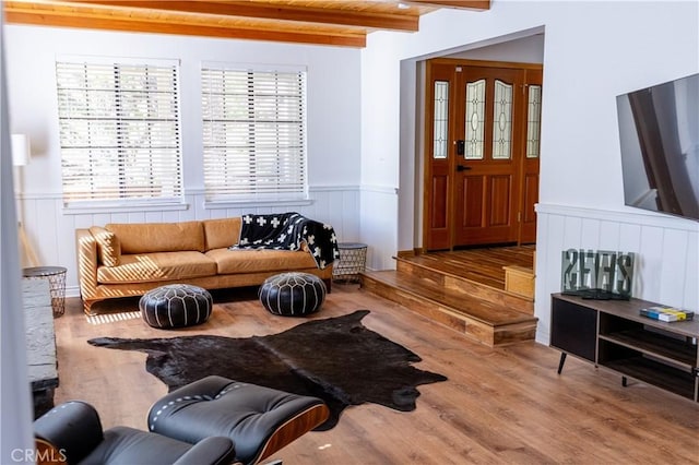 1075 Rivera Dr, Wrightwood, CA 92397 - living room featuring wooden ceiling, wood finished floors, beamed ceiling, and wainscoting