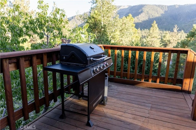 1075 Rivera Dr, Wrightwood, CA 92397 - wooden deck with a mountain view and a wooded view