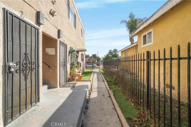 exterior space featuring fence and a residential view