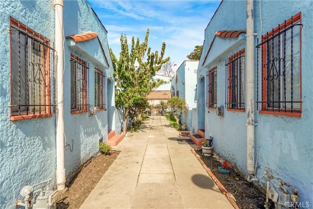 view of property exterior with a patio and stucco siding