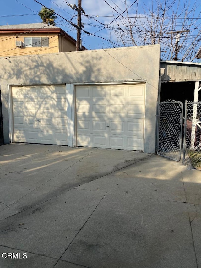 detached garage with fence