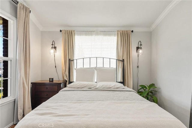 bedroom featuring ornamental molding