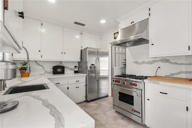 kitchen with white cabinetry, under cabinet range hood, appliances with stainless steel finishes, and a sink