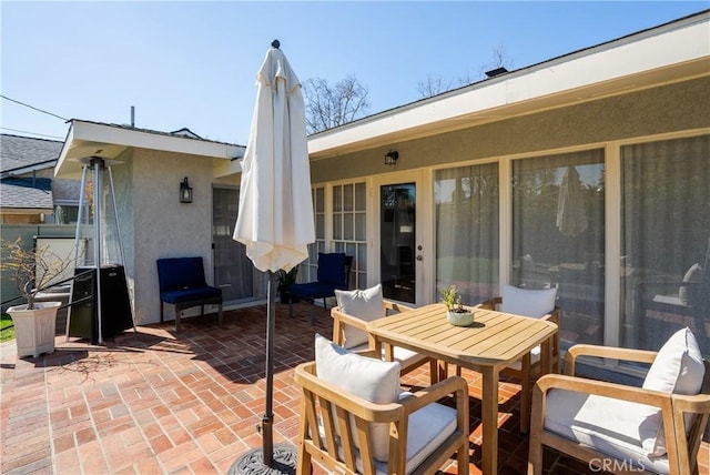 view of patio with outdoor dining space