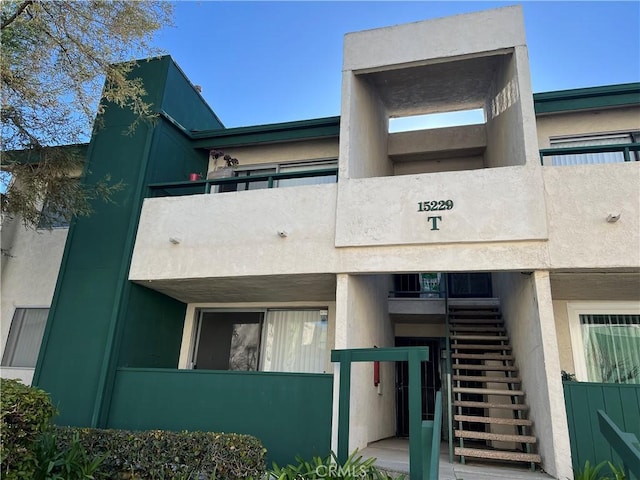 view of building exterior featuring stairs