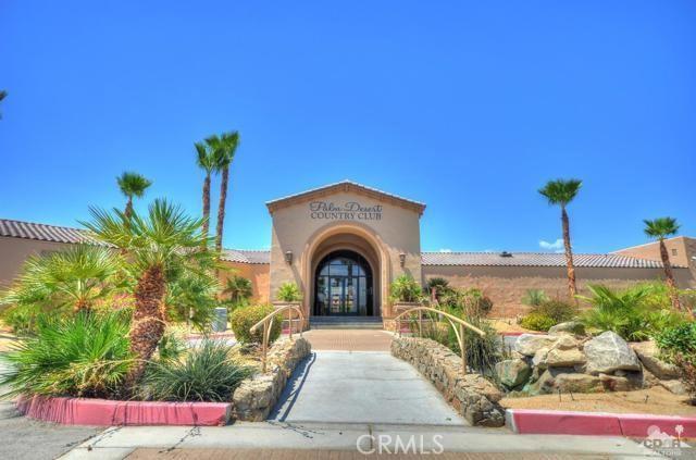 entrance to property with french doors and stucco siding