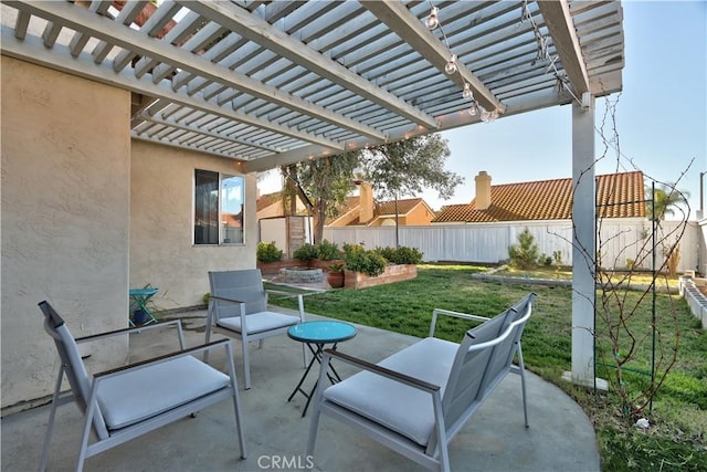 view of patio / terrace with a pergola and fence